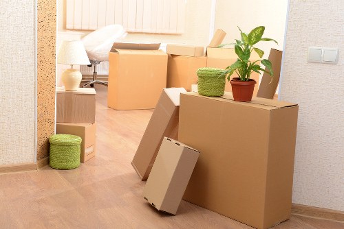 Organized boxes and home belongings placed into storage in Newmalden