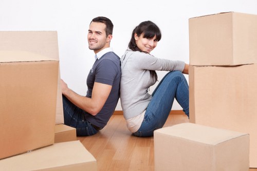 Packing materials and furniture ready for removals in Newmalden